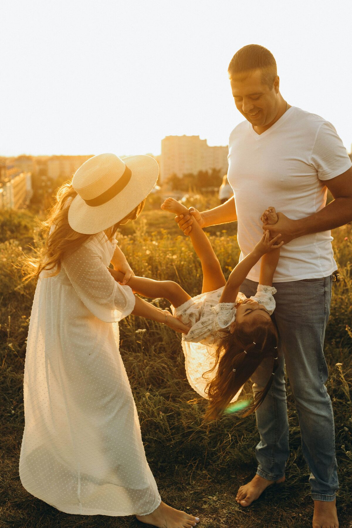 A couple sharing a quiet moment in a golden meadow